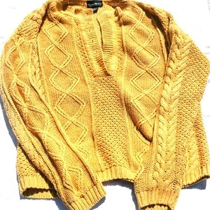A cute oversized cream yellow sweater